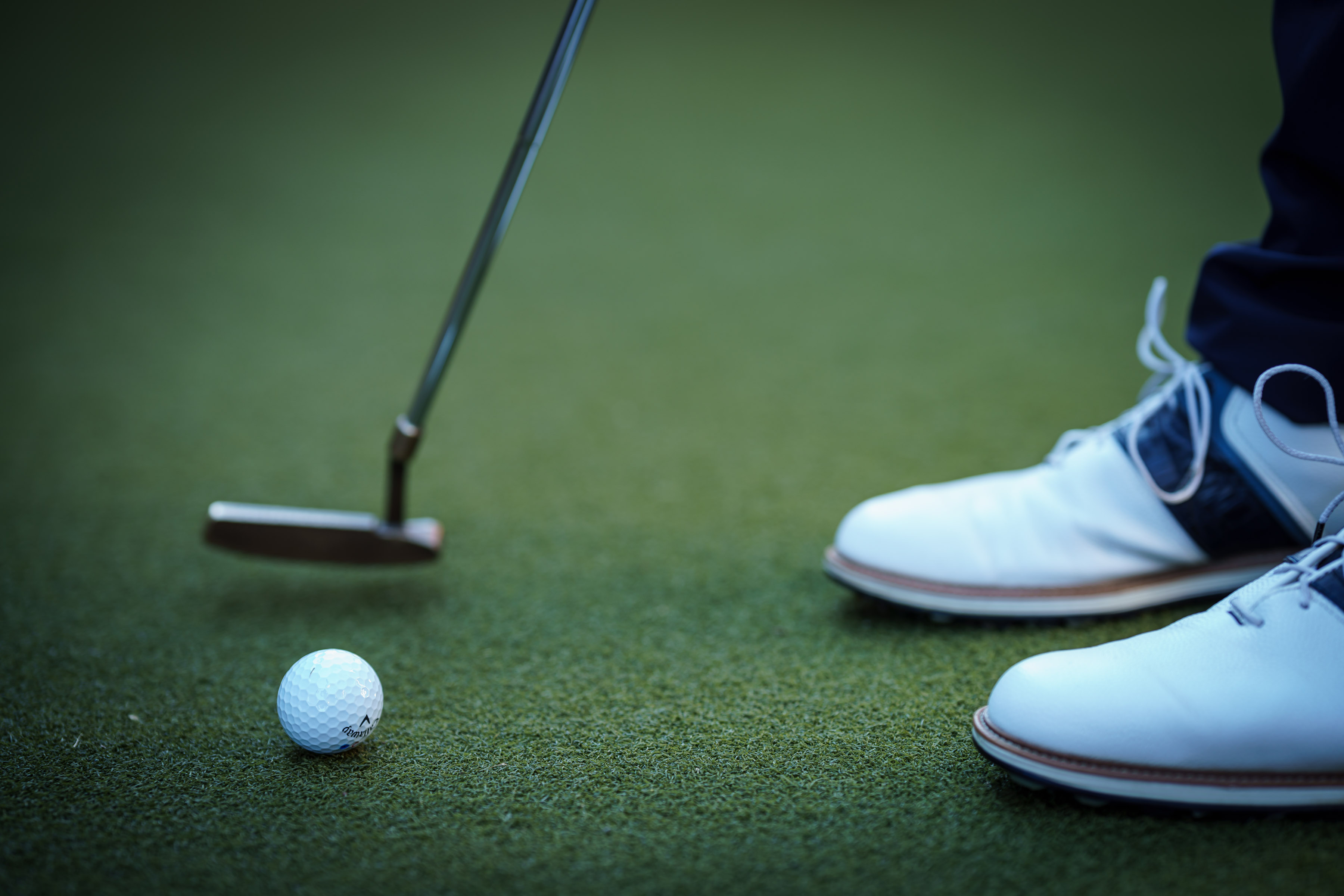 Wade Kerzie addressing a putt on the green