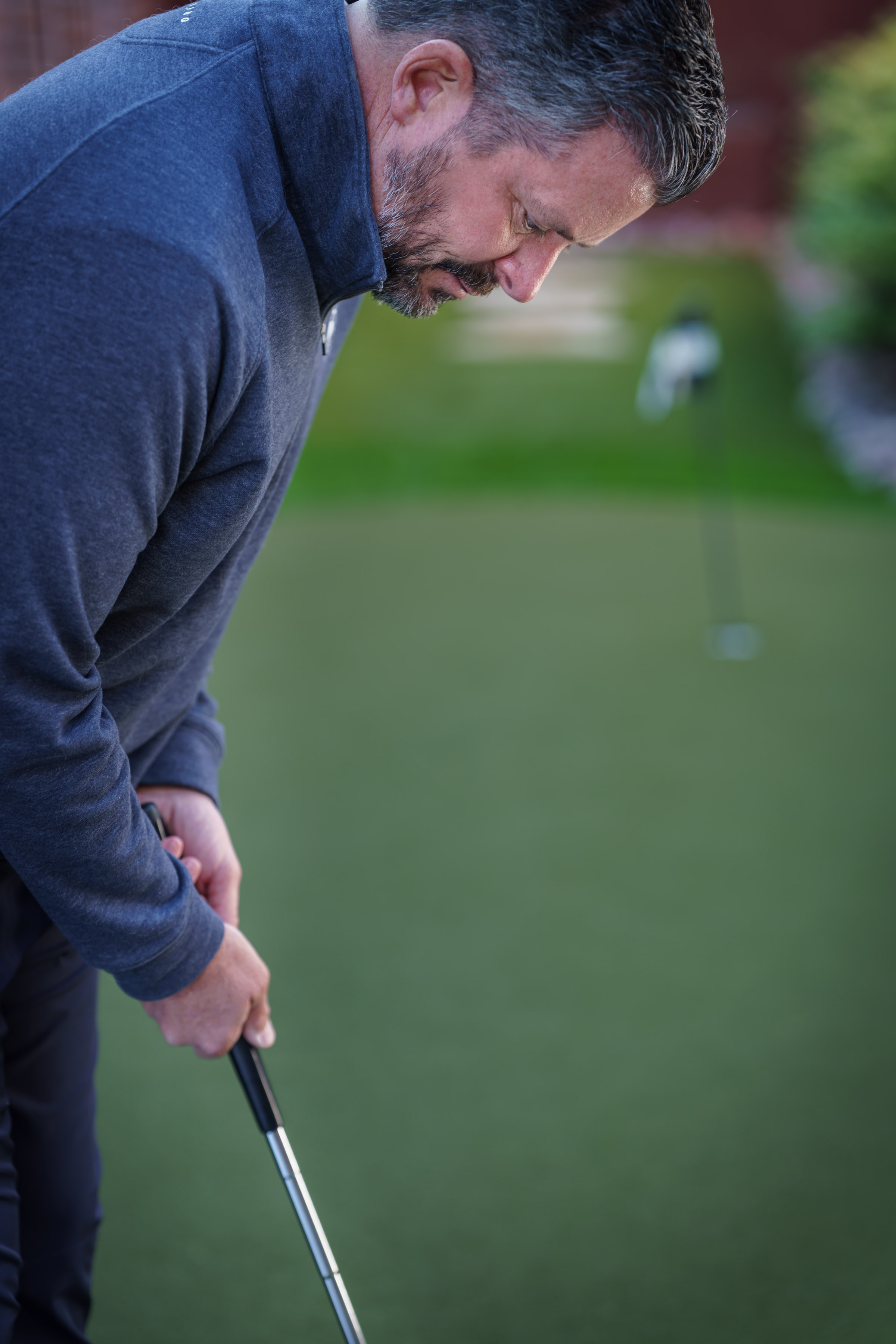 Wade Kerzie surveying a putt